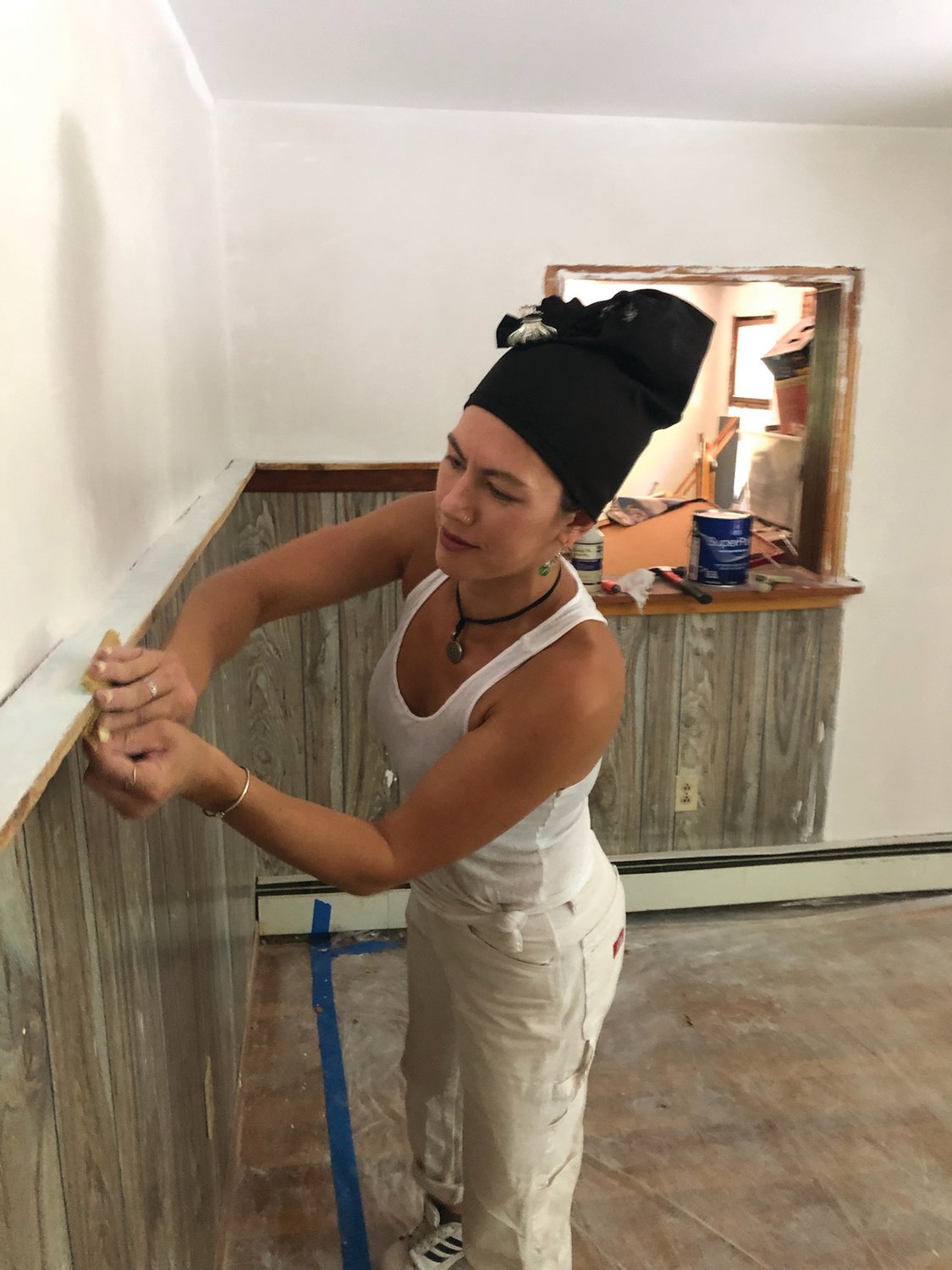 HARD WORK: N.E. Building & Restoration Project Manager Chanya Sae-Eaw worked hard on Pavia’s home. She and contracting business owner David Rosati went way above and beyond in their efforts to restore the veteran’s home to livability.